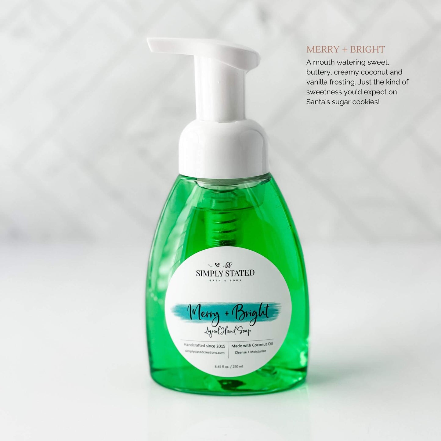 2023 Christmas Collection Liquid Hand Soap in Merry & Bright (green color). A mouth watering sweet, buttery, creamy coconut and vanilla frosting. Just the kind of sweetness you'd expect on Santa's sugar cookies!